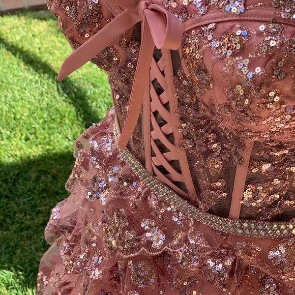 Glitter Mesh Corset Tiered Ballgown with Sequin and Ruffle Detail.
Prom dress. - Picture 14 of 17